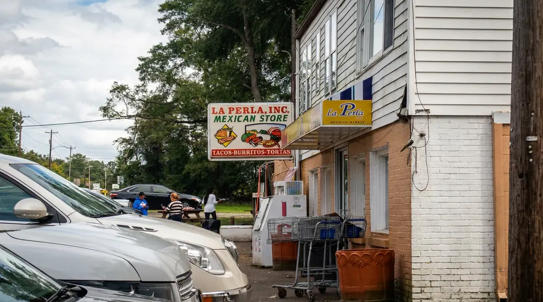 La Perla Mexican Store and its sign viewed from the street